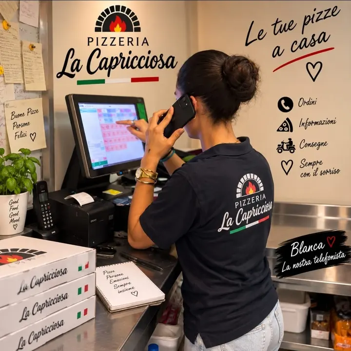 Blanca atendiendo pedidos por teléfono en La Capricciosa